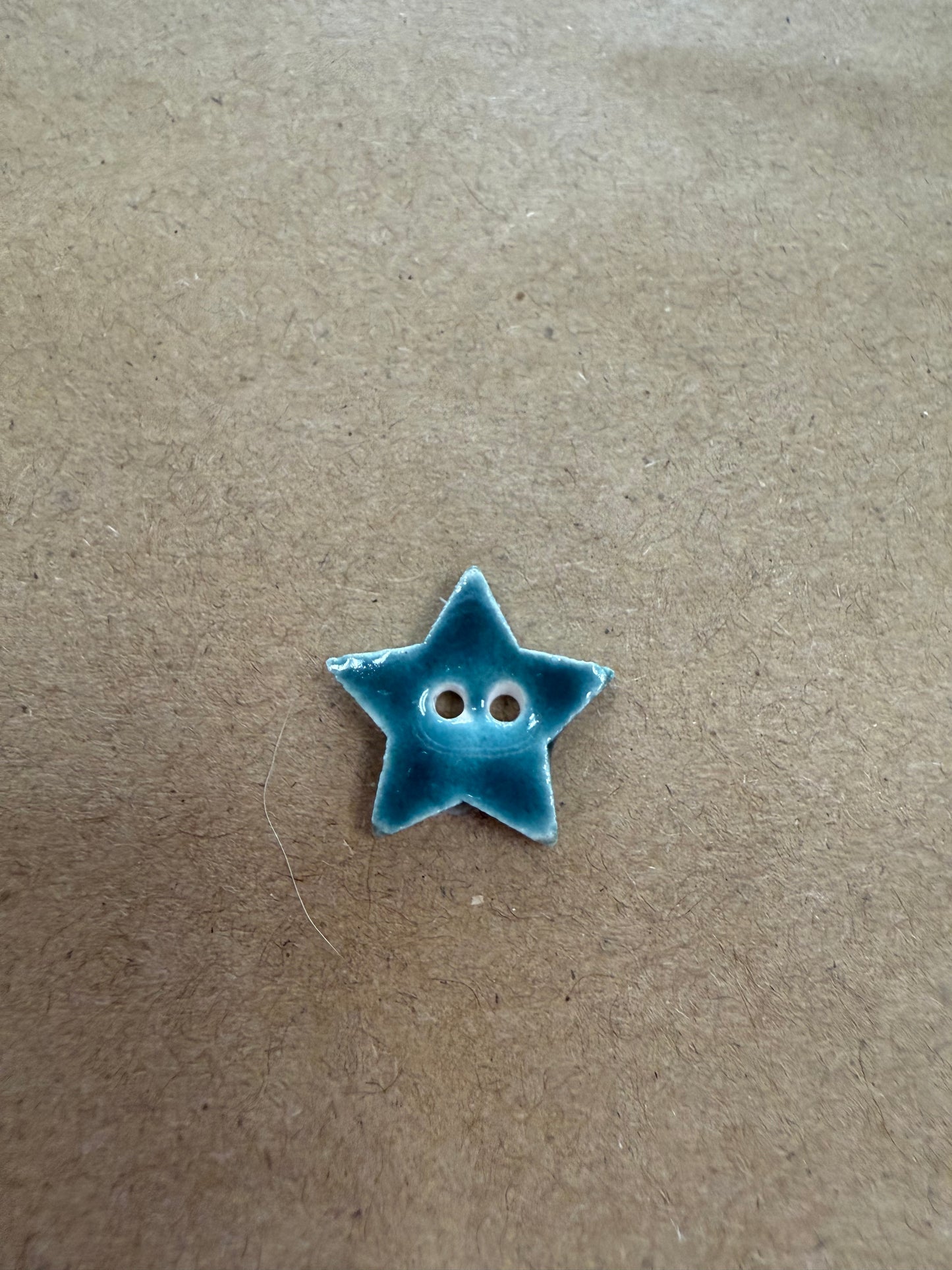 Star, teal small porcelain button, Mill Hill