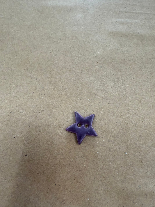 Star, plum small porcelain button. Mill Hill